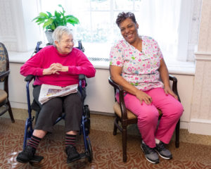 Senior with Nurse in Assisted Living